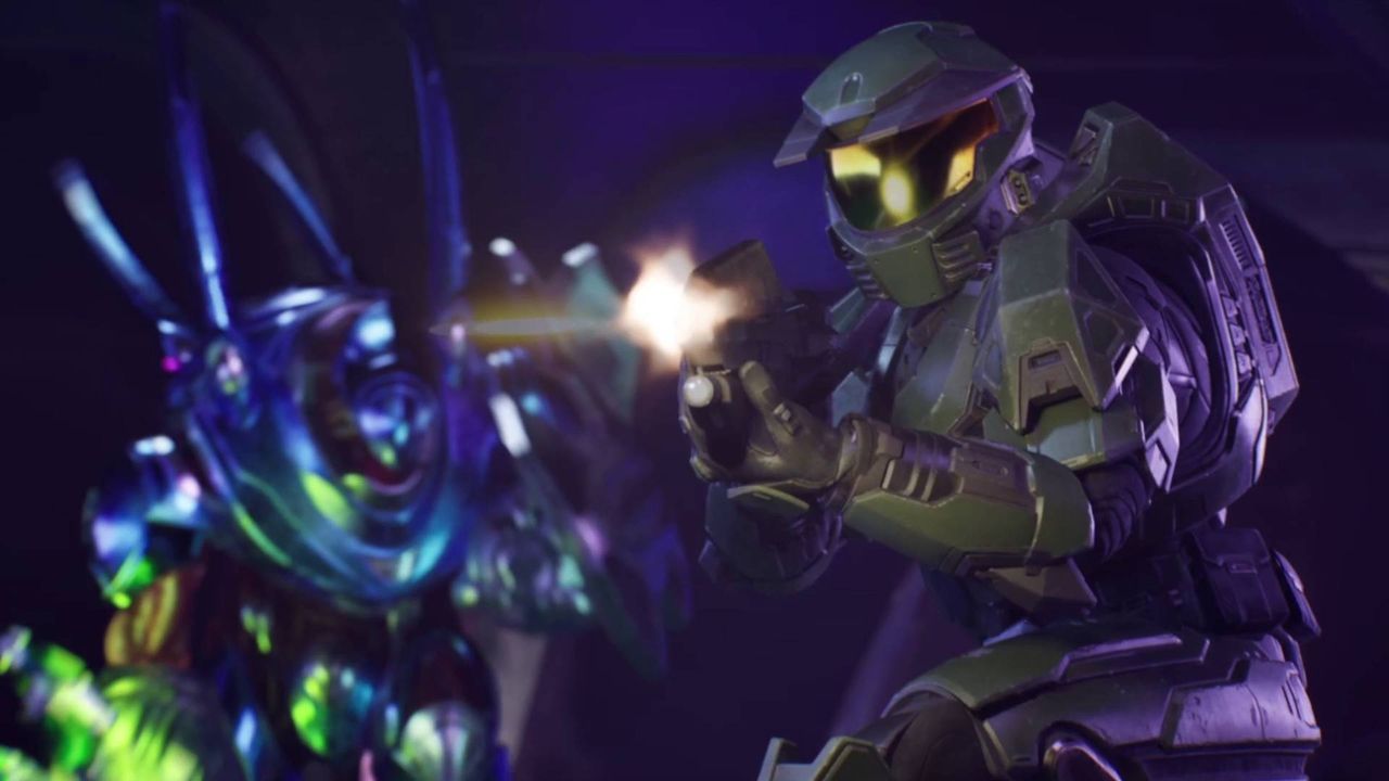 Halo: Campaign Evolved shows Master Chief firing as a Hunter advances behind him. - gamesradar.com