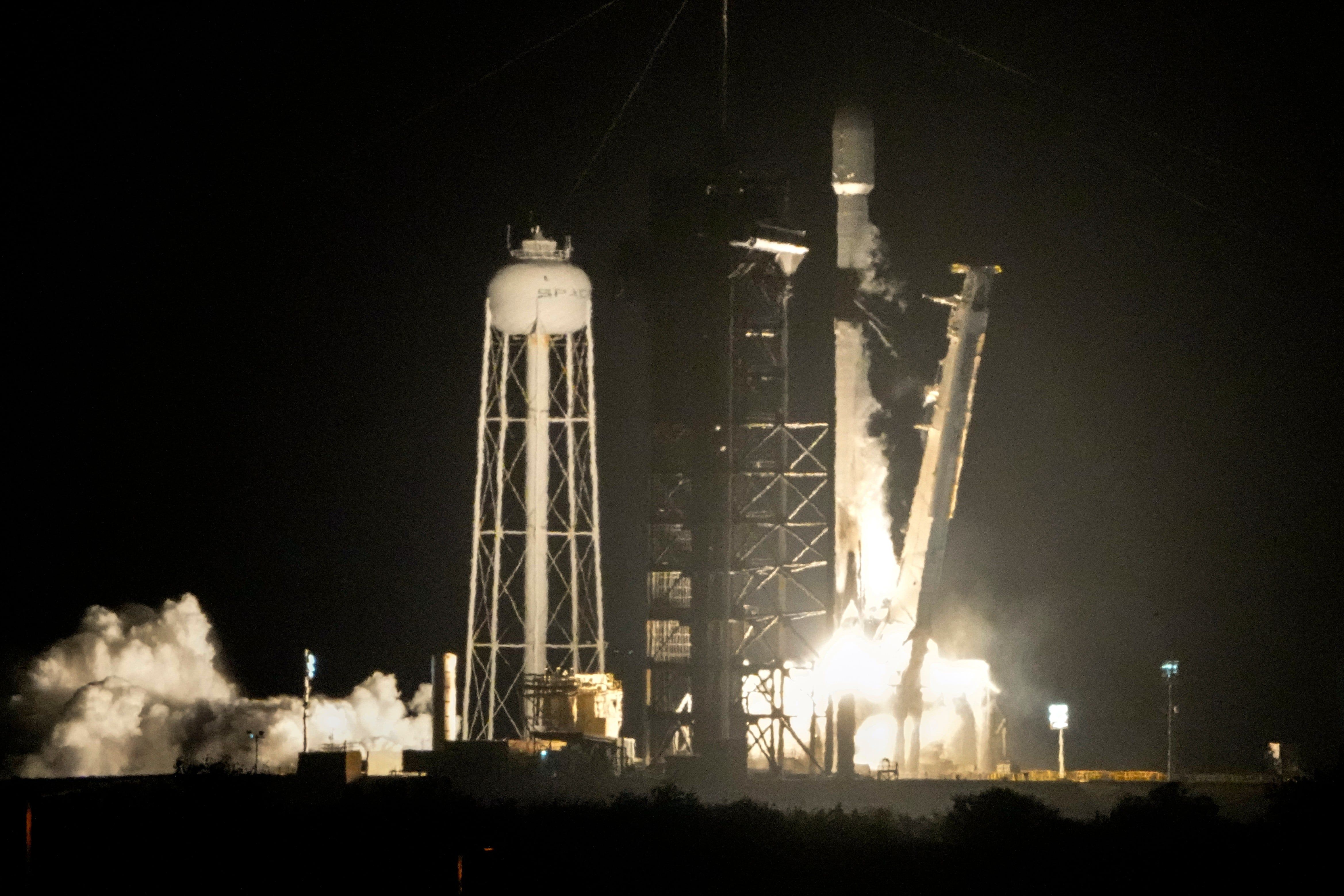 A SpaceX Falcon 9 rocket lifts off from pad 39A with a payload of a pair of lunar landers at Kennedy Space Center in Cape Canaveral, Fla., Jan. 15, 2025. - AP Photo/John Raoux