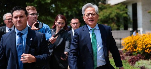 Nvidia CEO Jensen Huang talks to members of the press as he leaves the Hart Senate Office Building on July 28, 2026. - Finn Gomez / Getty Images
