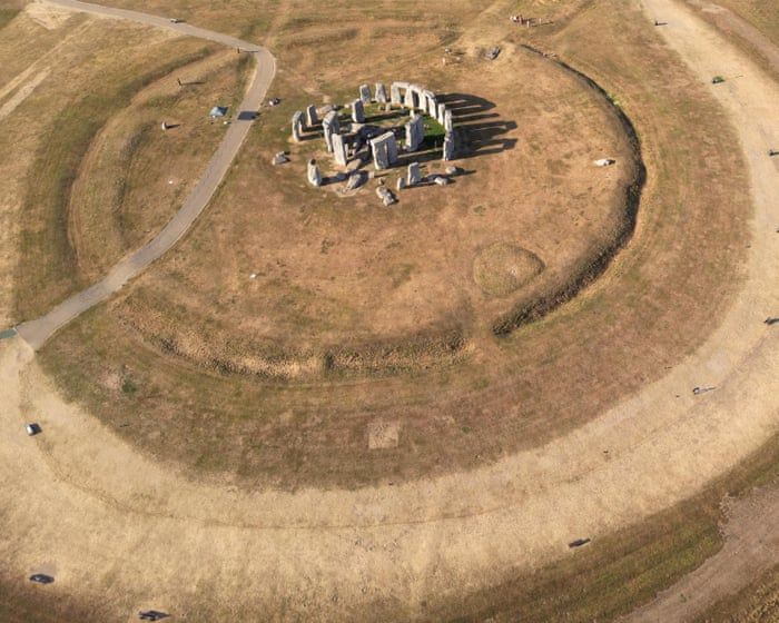 Stonehenge in Wiltshire is one of many green, grassy landscapes dried out by extreme hot weather this summer. - Toby Melville/Reuters