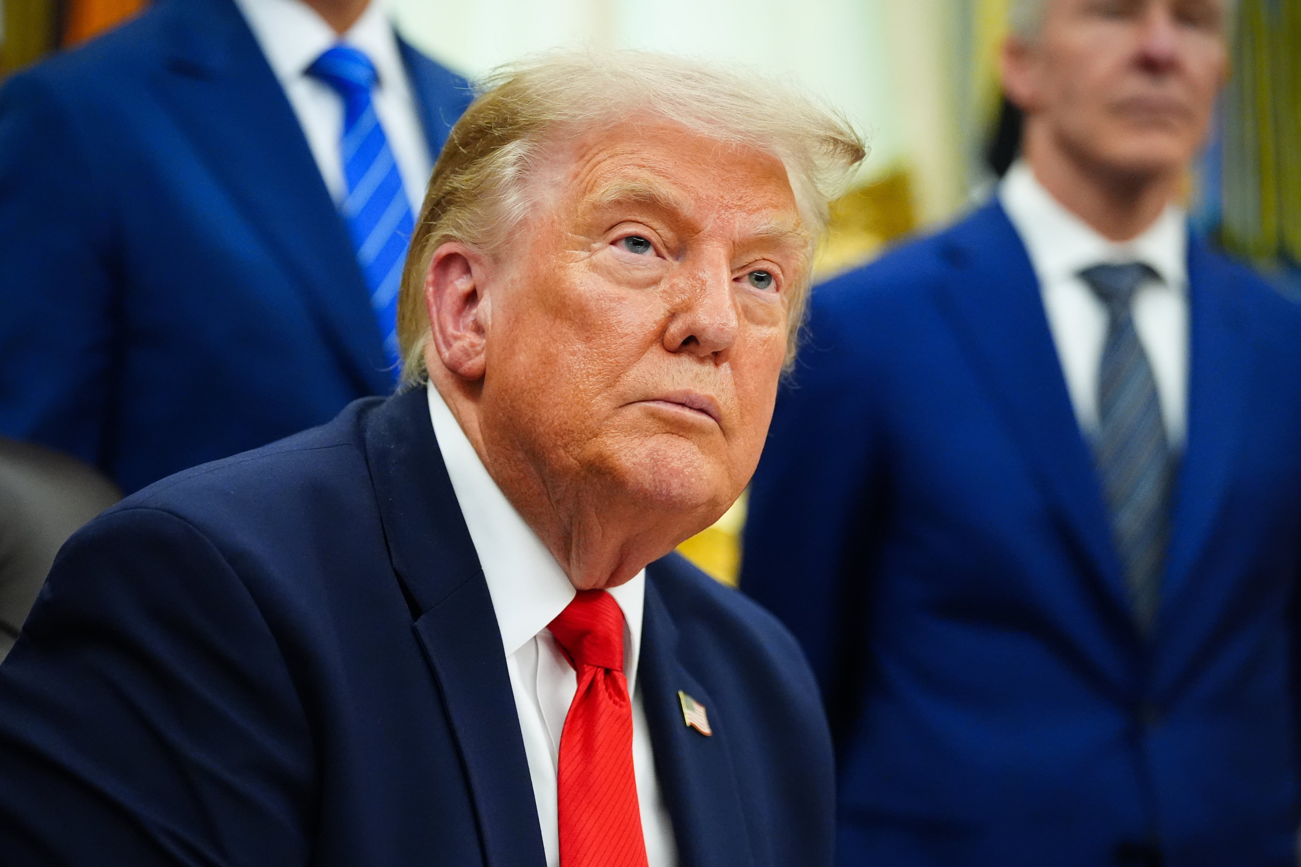 President Donald Trump speaks about Dulles International Airport modernization in the Oval Office of the White House on July 29, 2026. - AP Photo/Julia Demaree Nikhinson
