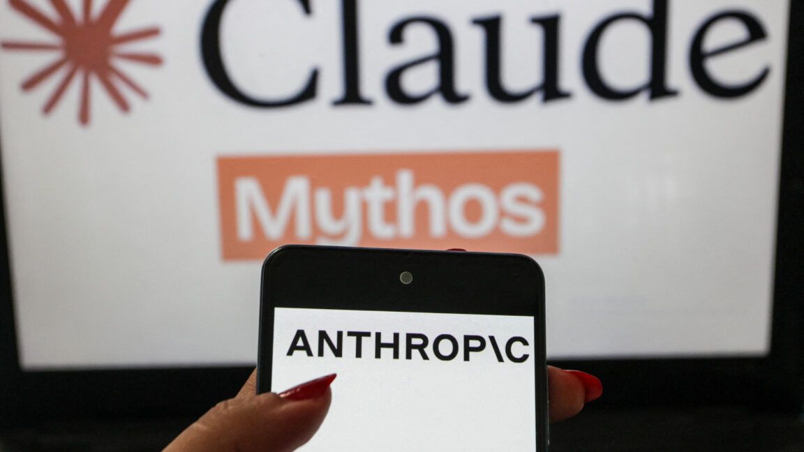 A smartphone displaying the Anthropic logo is shown in the foreground with a blurred Claude Mythos themed background. - Imen Ben Youssef / Hans Lucas / AFP via Getty Images