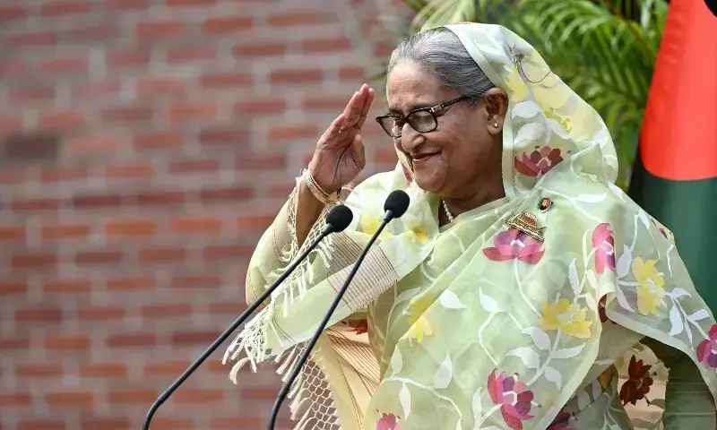 Bangladesh's former prime minister Sheikh Hasina accepts greetings from media and election observers in Dhaka on January 8, 2024. - AFP/File
