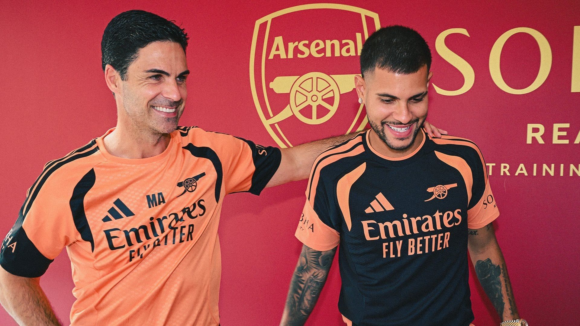 Bruno Guimaraes with Arsenal manager Mikel Arteta. - Arsenal FC