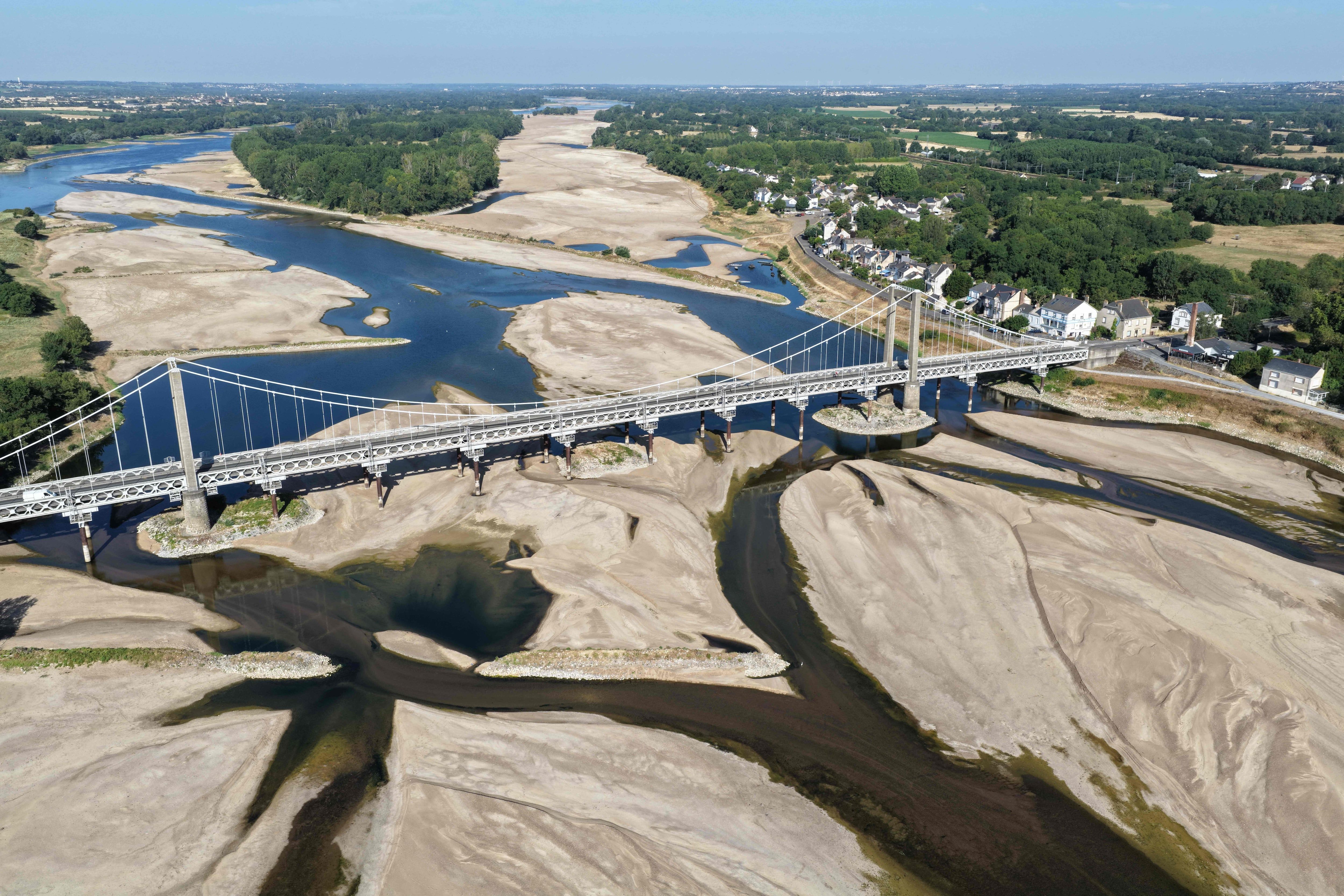 A bridge over the dried Loire riverbed in Loireauxence, western France. - AFP/Yonhap