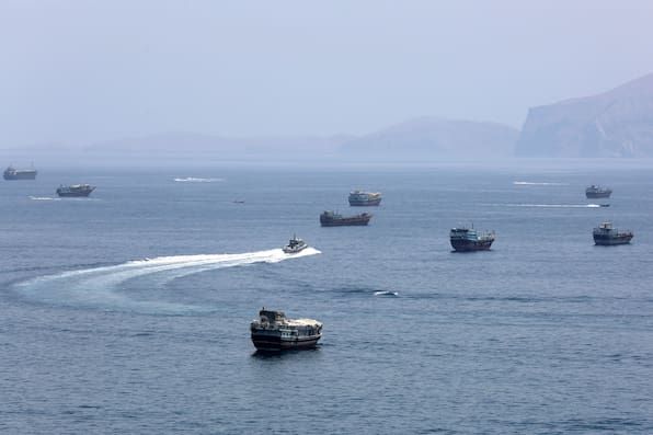 Commercial ships near Khasab, Oman, in the Strait of Hormuz. - Wen Xinnian