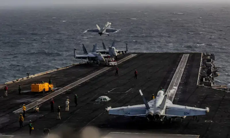 An F/A-18E Super Hornet launches from the flight deck of Nimitz-class aircraft carrier USS Abraham Lincoln during the conflict with Iran. - Reuters