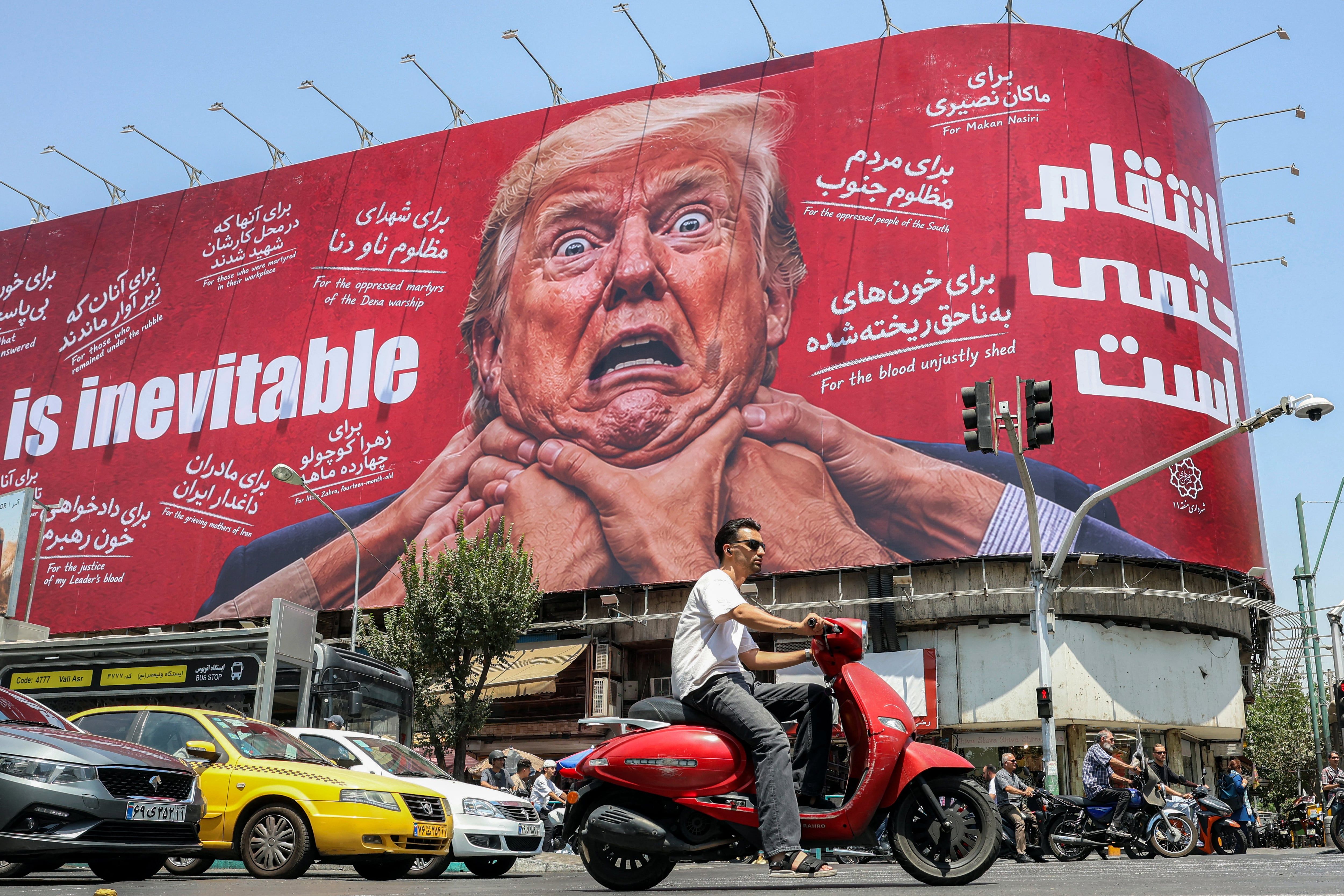 A billboard in central Tehran referenced revenge against President Trump in July, according to the source caption. - AFP