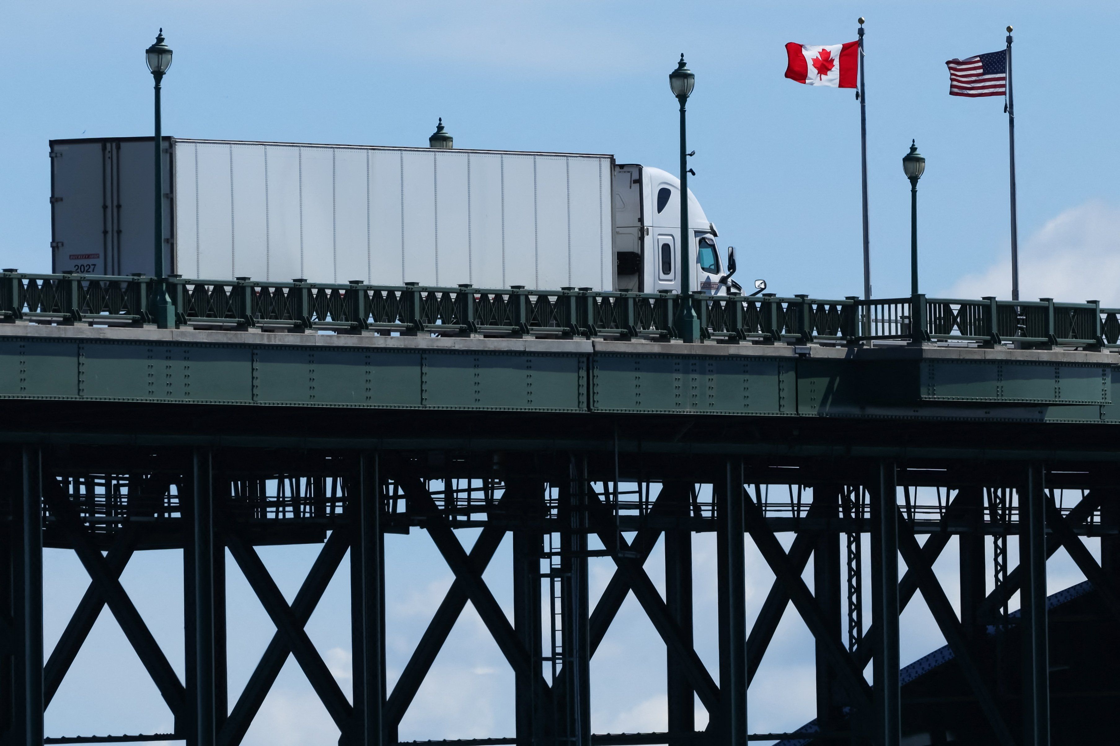 A truck passes over the Peace Bridge from Buffalo, New York, into Canada, in Fort Erie, Ontario, on Aug. 18, 2026. - nbcmiami.com