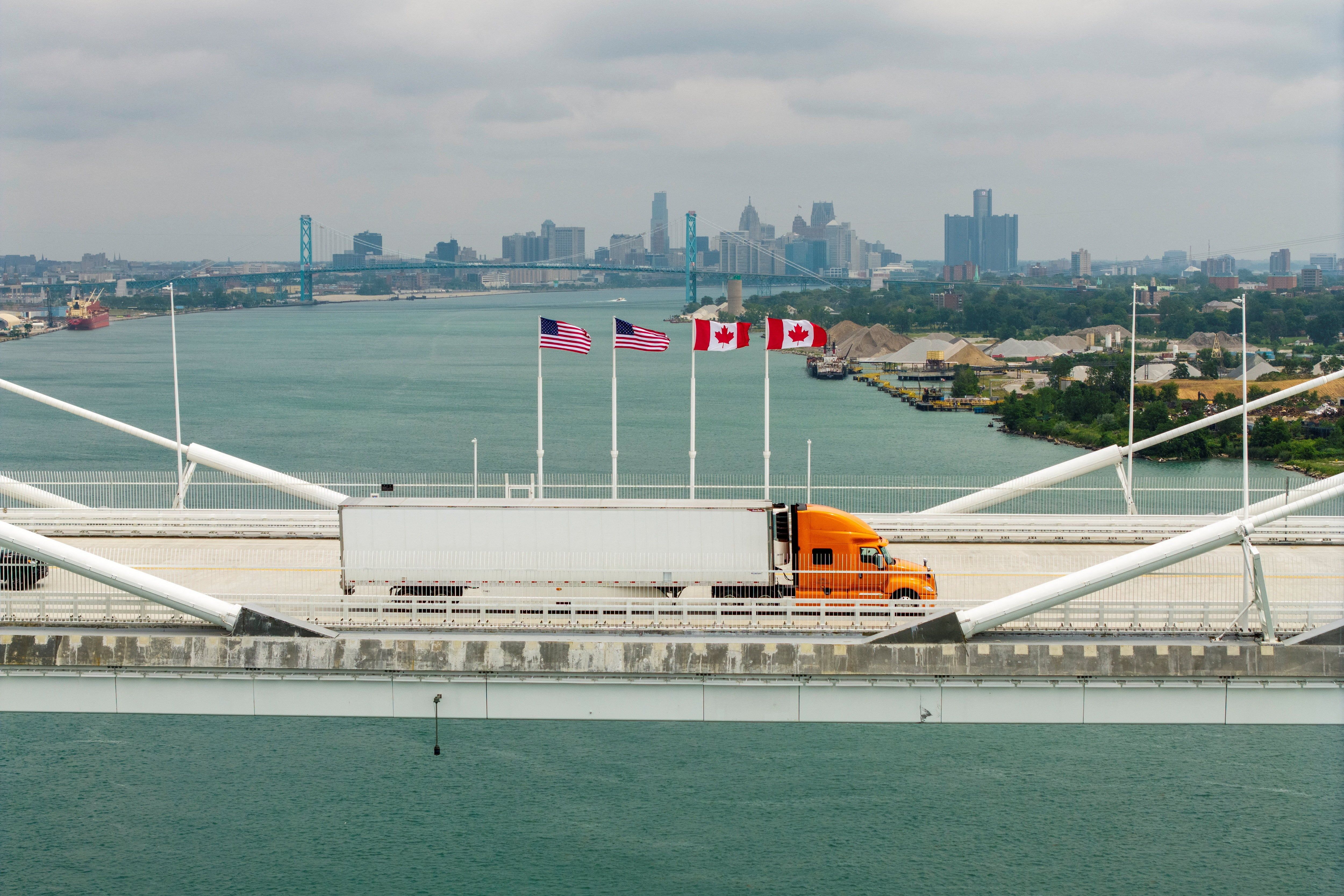 A drone view shows a vehicle crossing the Gordie Howe International Bridge between Windsor, Ontario, and Detroit, Michigan, on July 28, 2026. - REUTERS/Carlos Osorio
