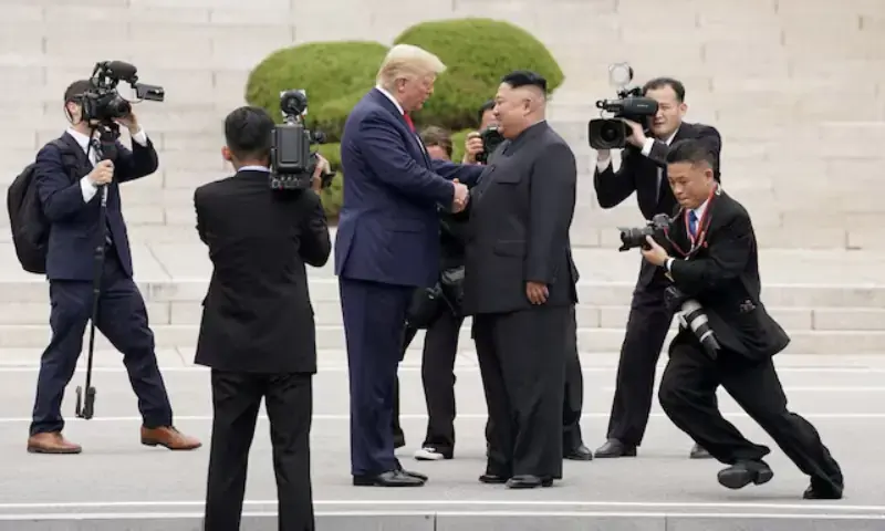 U.S. President Donald Trump with North Korean leader Kim Jong Un. - Reuters