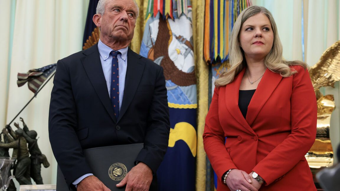 Health and Human Services Secretary Robert F. Kennedy Jr. and Dr. Heidi Overton stand in the Oval Office after President Trump signed an executive order calling for childhood vaccine shots to be spaced out into separate visits. - Getty/Anna Moneymaker