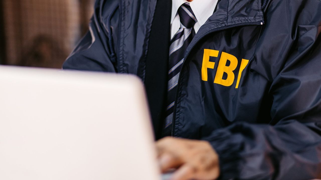 An FBI agent using a computer. - pcgamer.com