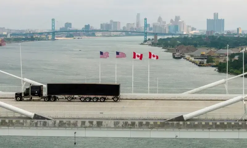 A vehicle crosses the Gordie Howe International Bridge between Windsor, Ontario, and Detroit, Michigan, the day after it opened. - Reuters