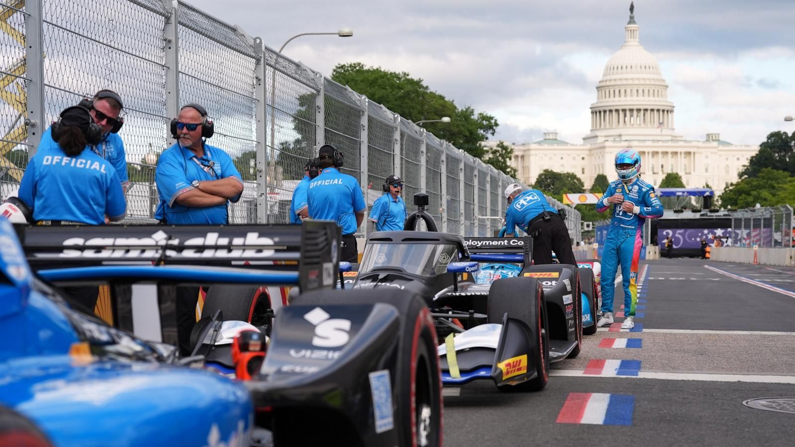 President Trump waves the green flag to start the IndyCar Freedom 250 Grand Prix in Washington. - Doug Mills/The New York Times via AP, Pool