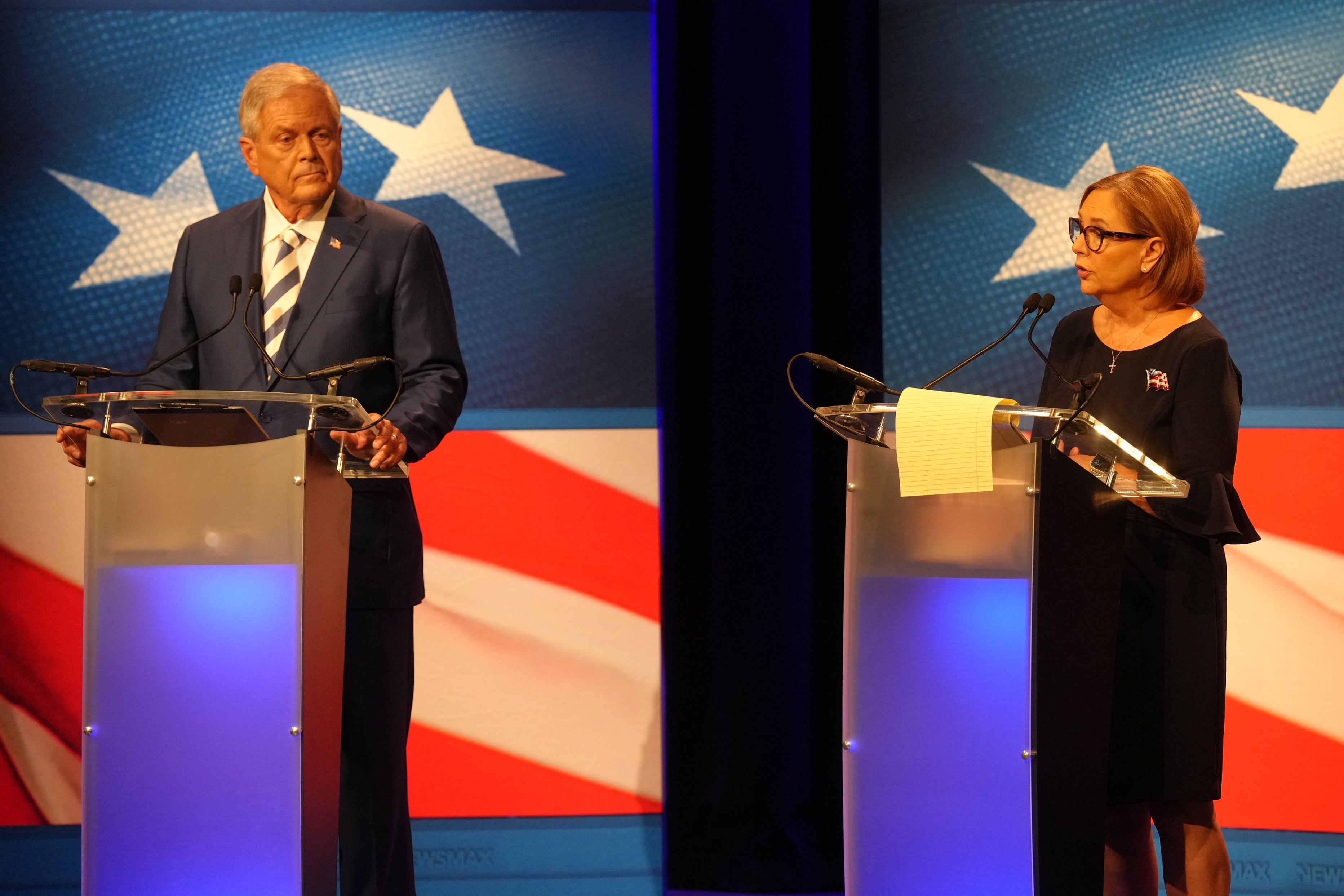 U.S. Rep. Ralph Norman, R-S.C., left, looks on as Sen. Darline Graham, R-S.C., speaks during a debate ahead of the special GOP Senate runoff election to replace the late Sen. Lindsey Graham, R-S.C., in Newberry, S.C., Tuesday, Aug. 18, 2026. - AP Photo/Meg Kinnard