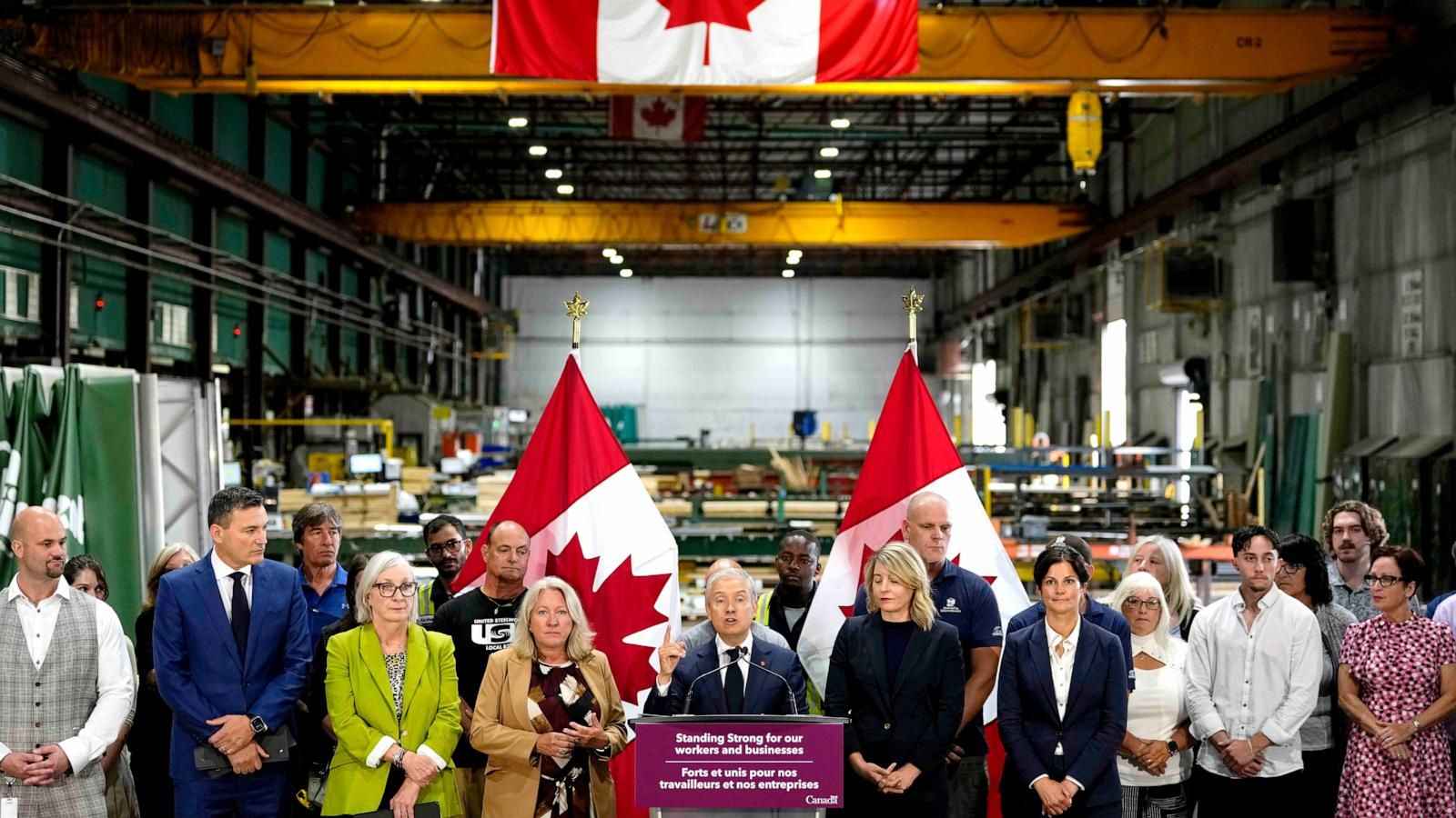 Minister of Finance and National Revenue Francois-Philippe Champagne speaks at a news conference on Canada's response to U.S. tariffs, at a roofing company in Ottawa, on Tuesday, Aug. 25, 2026. - Justin Tang/The Canadian Press via AP