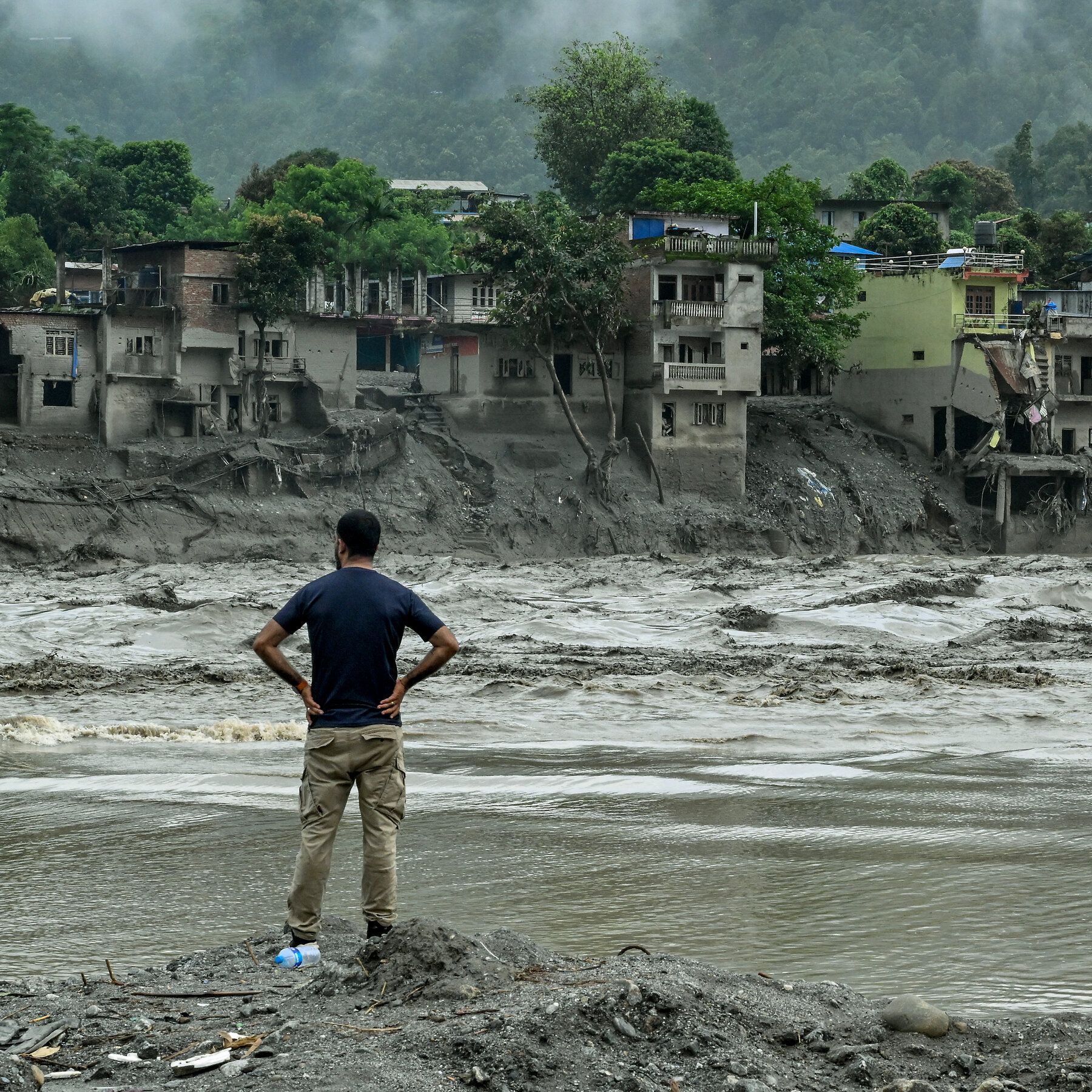 A swollen river in the Nuwakot district of Nepal yesterday. - nytimes.com