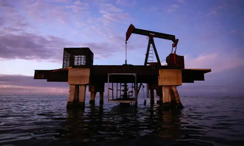 An oil pumpjack at Lake Maracaibo in Cabimas, Venezuela. - Reuters