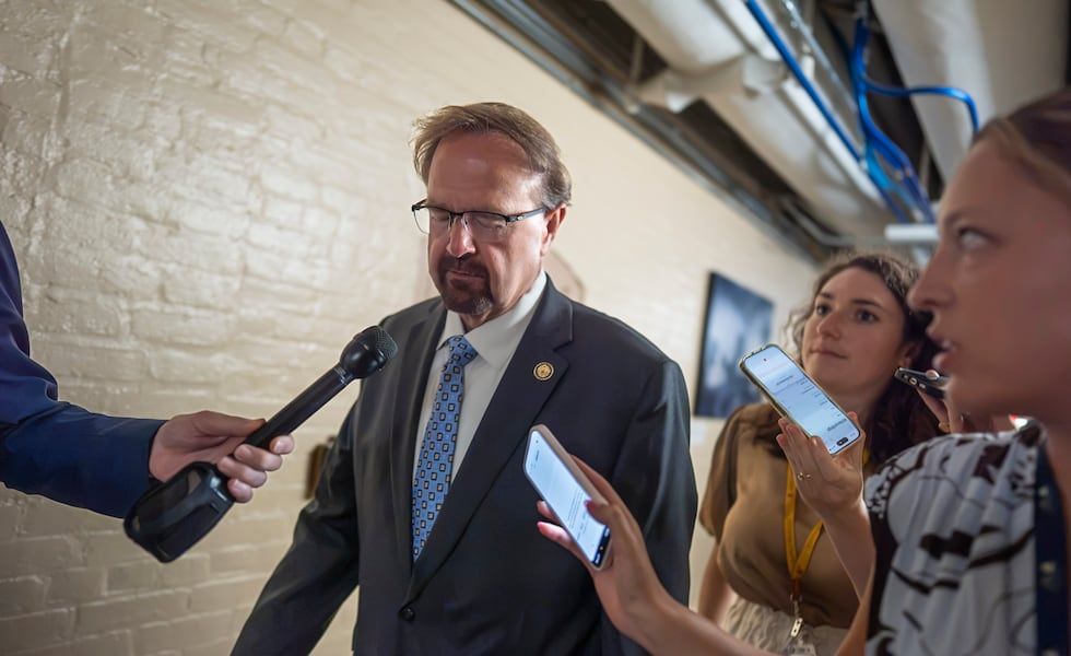 Rep. Chuck Edwards, R-N.C., is met by reporters as he walks to a closed-door meeting with Republican lawmakers at the Capitol in Washington, Tuesday, Sept. 1, 2026. - J. Scott Applewhite/Associated Press