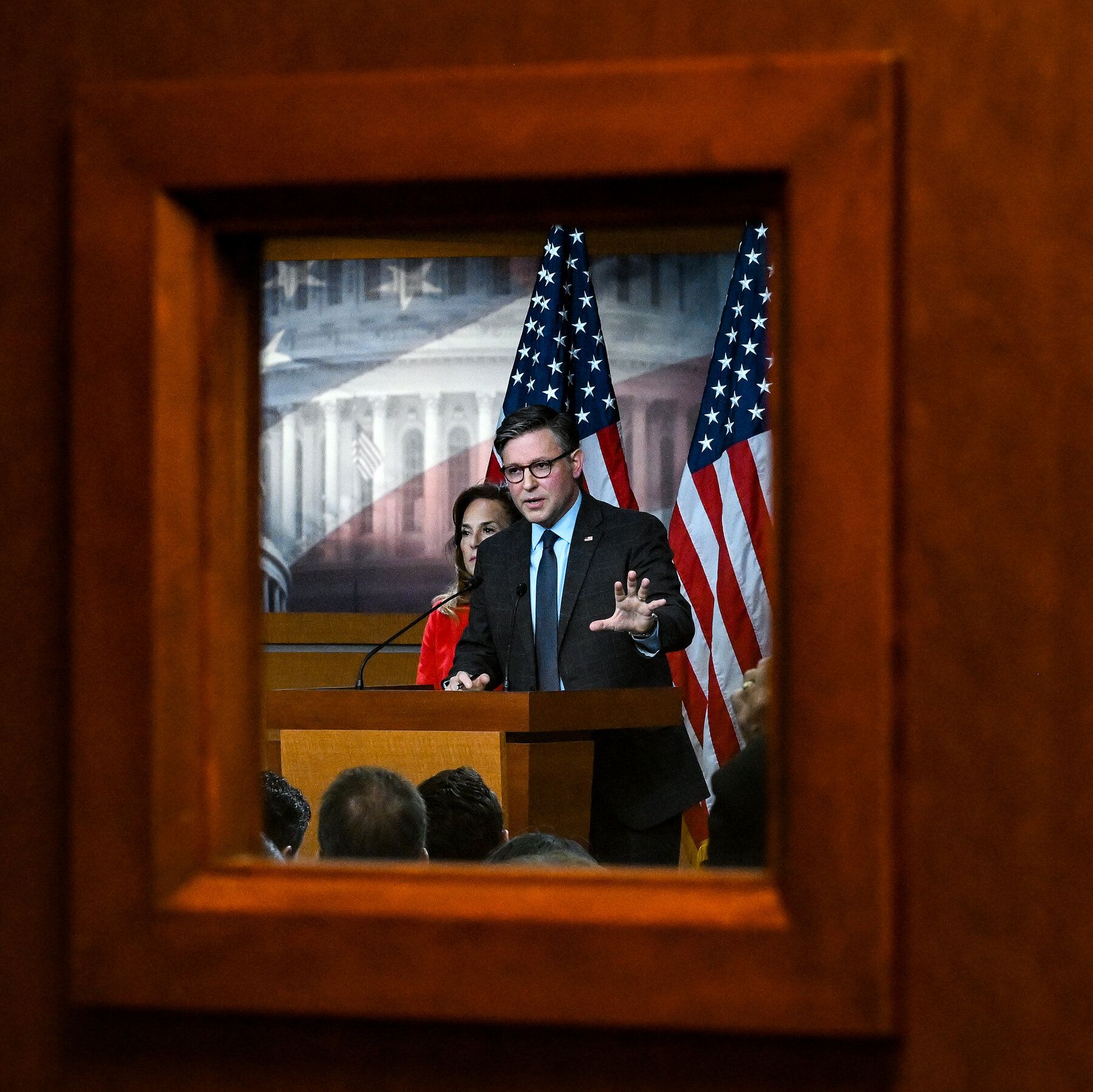 Speaker Mike Johnson at the Capitol on Tuesday morning. The stopgap bill would keep federal funding flowing at current levels through Dec. 11. - nytimes.com
