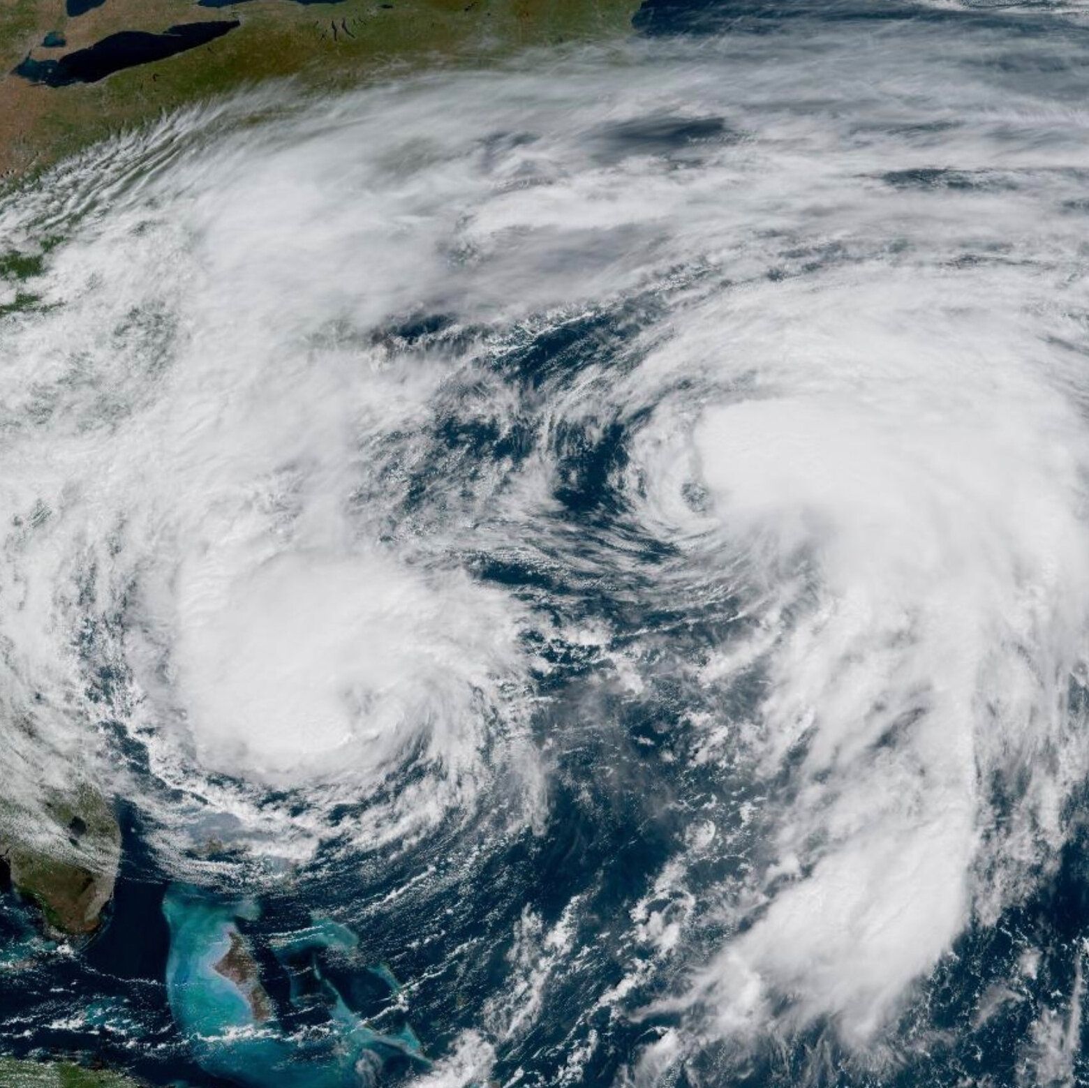Hurricane Imelda and Hurricane Humberto over the Atlantic Ocean in 2025. - The New York Times