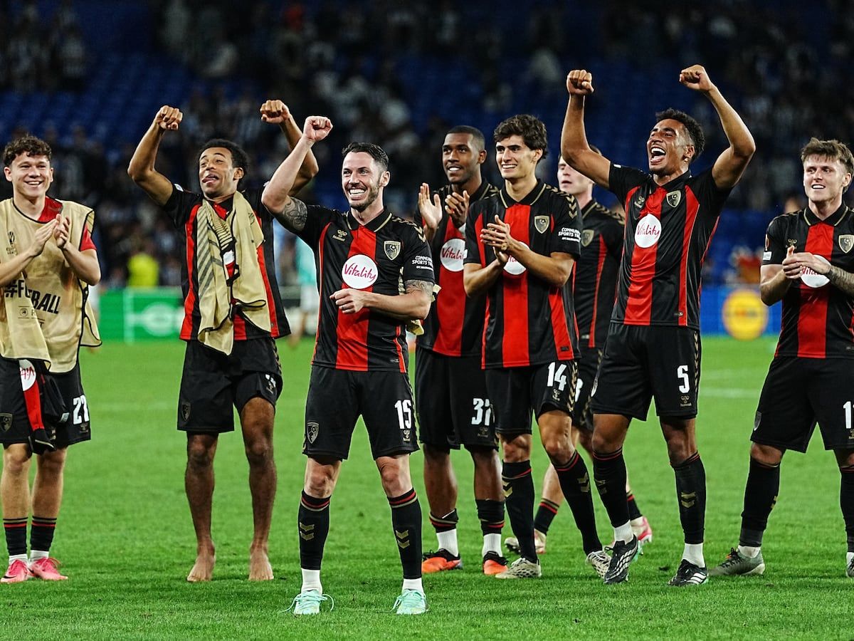 Bournemouth players celebrate with supporters after defeating Real Sociedad 2-1 in their first European match in San Sebastián. - AP Photo/Miguel Oses