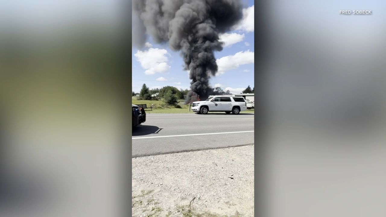 Video image showing the F-16 crash aftermath in northern Michigan - ABC7