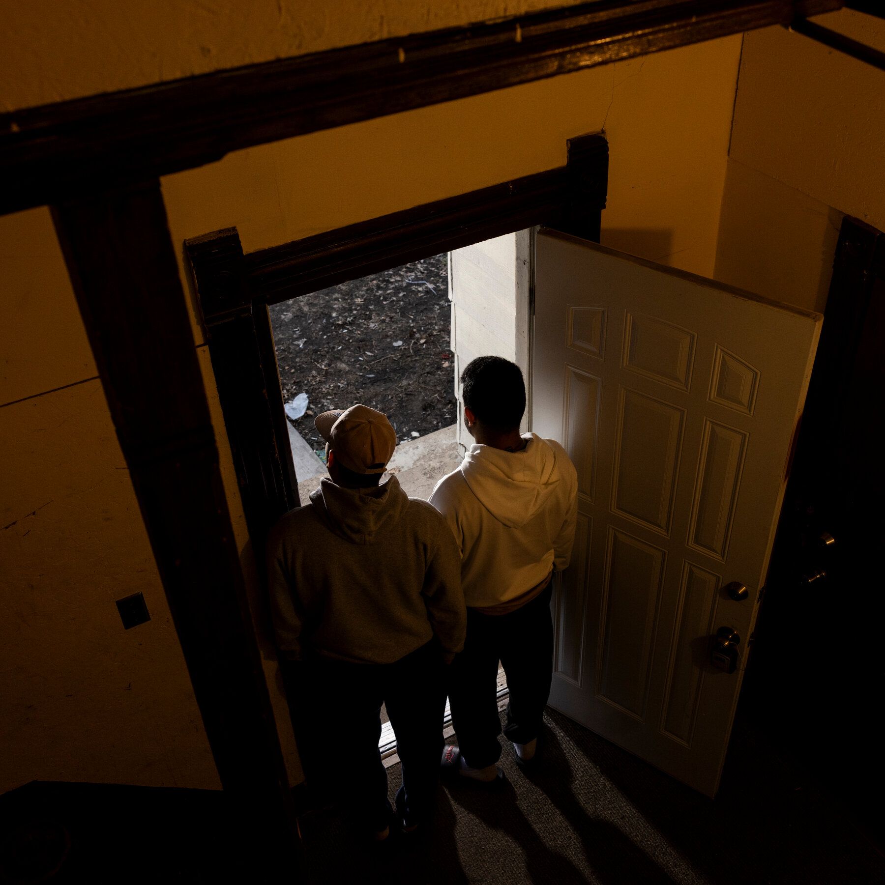 Julio Cesar Sosa-Celis, who was injured in the January shooting, stands at right. - The New York Times