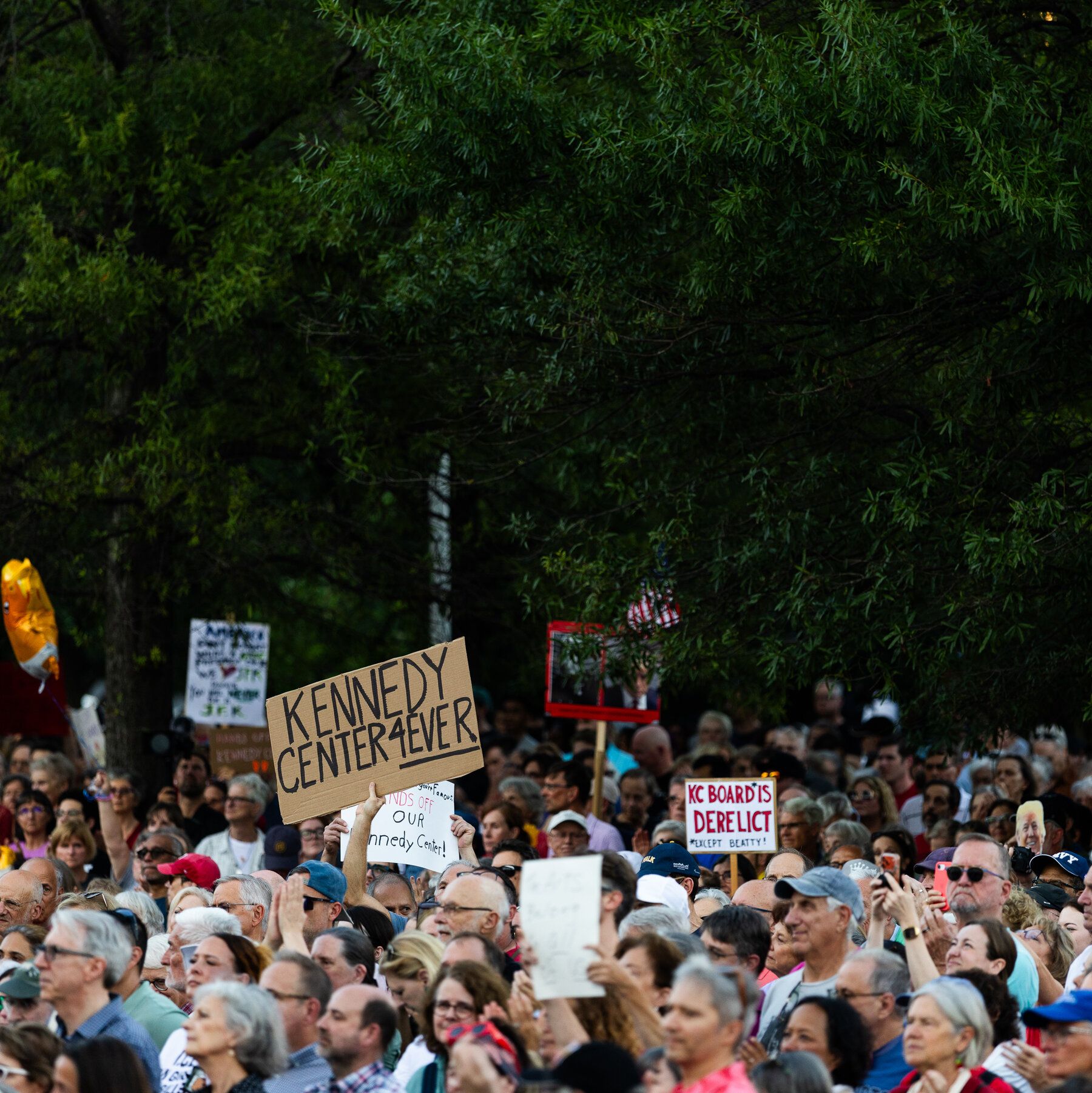 Demonstrators rally outside the Kennedy Center after its board voted to close the venue. - The New York Times