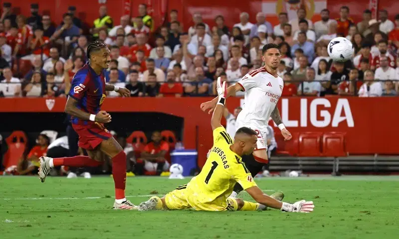 Raphinha scores for Barcelona against Sevilla at the Estadio Ramón Sánchez-Pizjuán on September 19, 2026. - Reuters