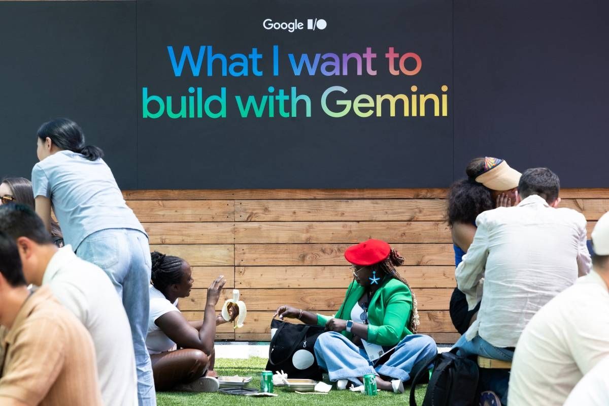 Attendees sit below a Gemini sign at Google I/O in Mountain View, California, on May 19, 2026. - Benjamin Fanjoy/Getty Images via AFP
