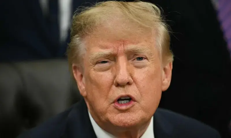 President Donald Trump speaks in the Oval Office of the White House on Sept. 18, 2026. - AFP