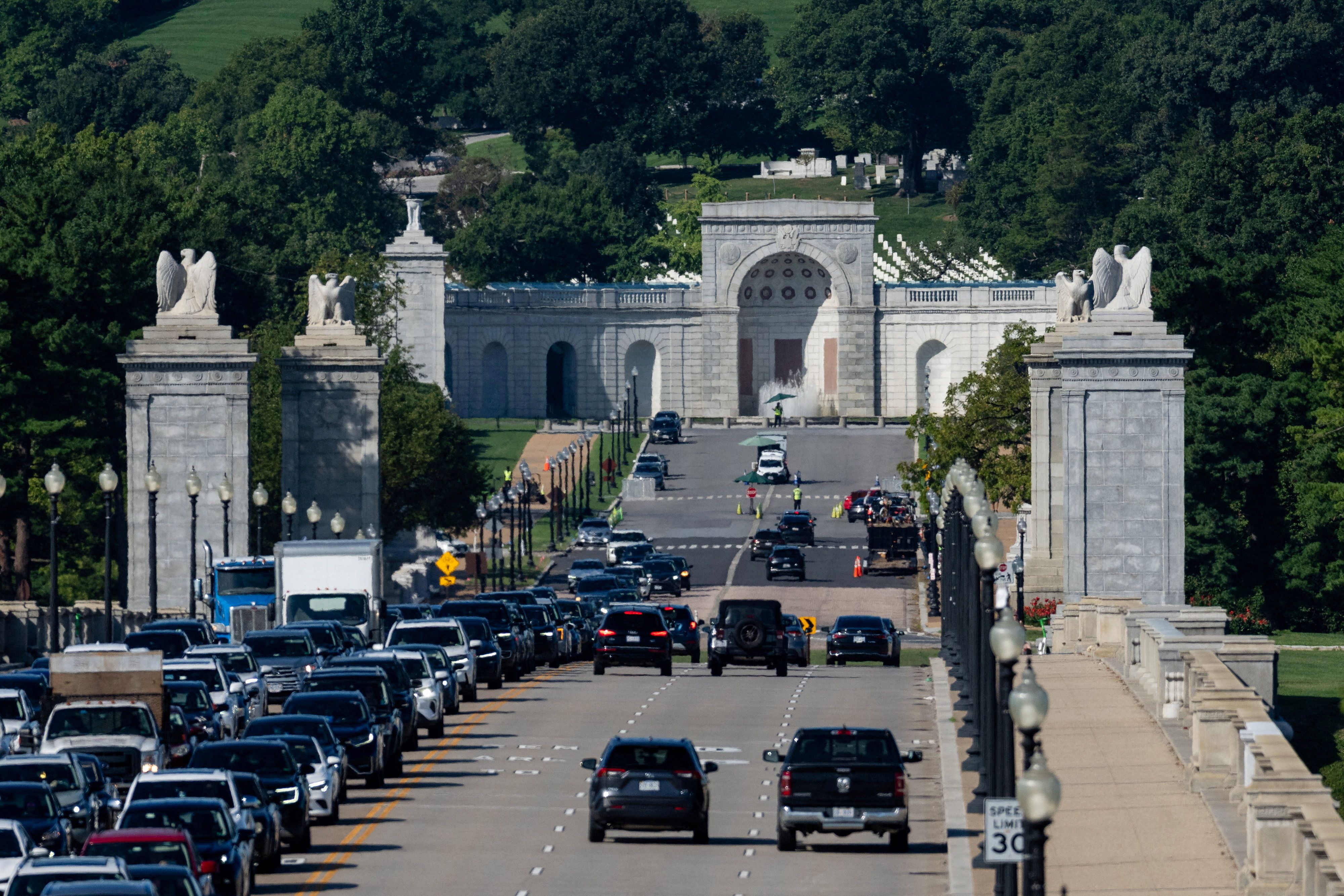 Cars drive along Memorial Bridge near Memorial Circle in Arlington, Virginia, the proposed site of the triumphal arch. - Eric Lee/Reuters