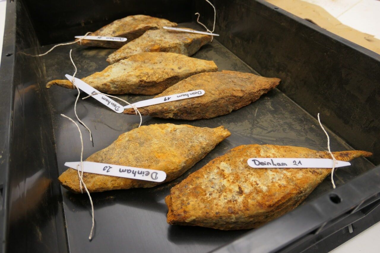 Iron bars recovered from the Deinham site, individually labeled for analysis. - Peter Trebsche