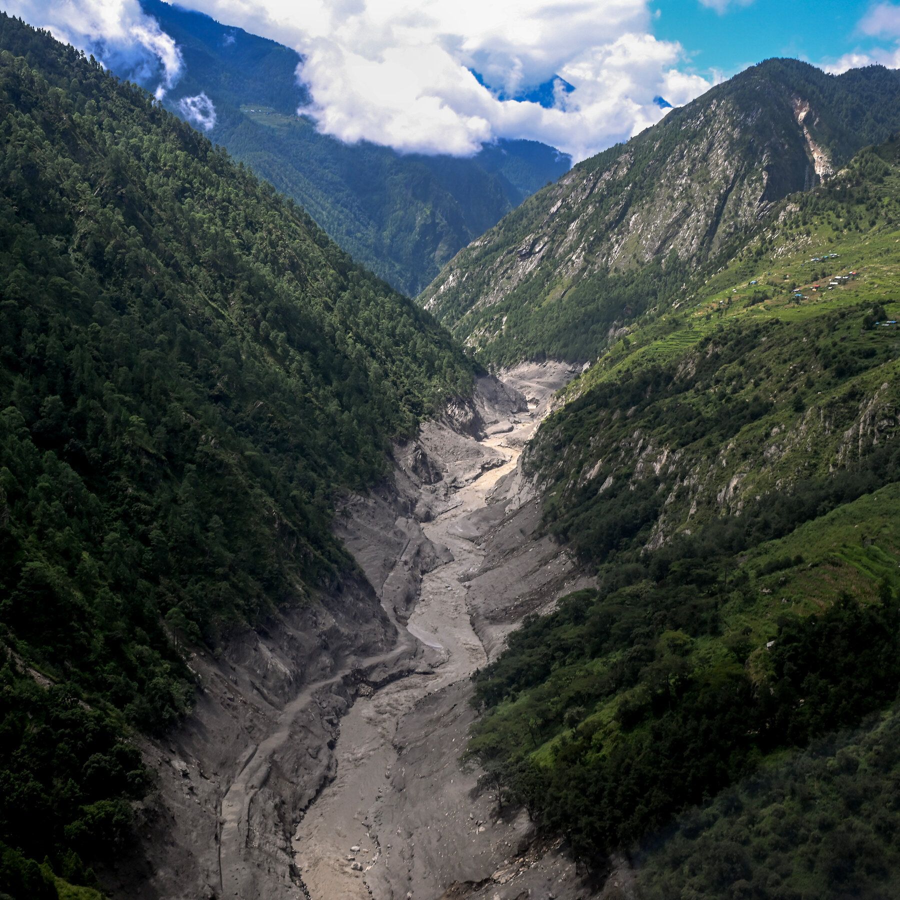 The widened channel of the Bhote Koshi River in Nepal after the flash flooding. - The New York Times