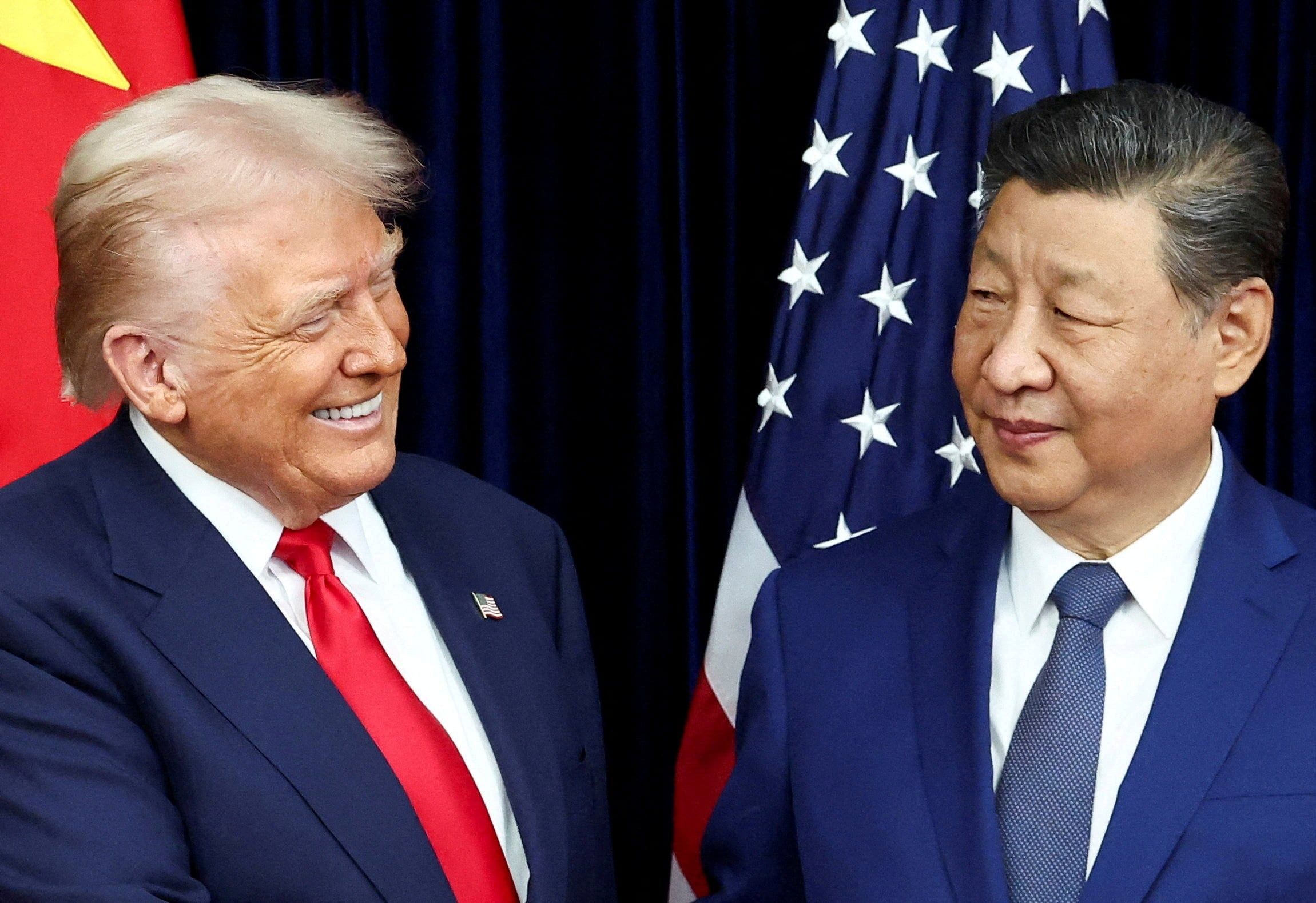 President Donald Trump and President Xi Jinping during their previous meeting in Busan, South Korea. - Reuters