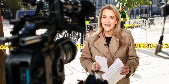 CNN White House correspondent Betsy Klein works near the White House after reporters were initially barred despite a judge’s order, Washington, D.C., Sept. 24, 2026. - Reuters