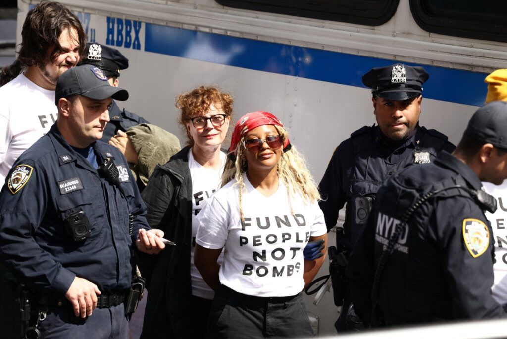 Police detain demonstrators near the United Nations during the protest on Sept. 24. - Charly Triballeau/AFP