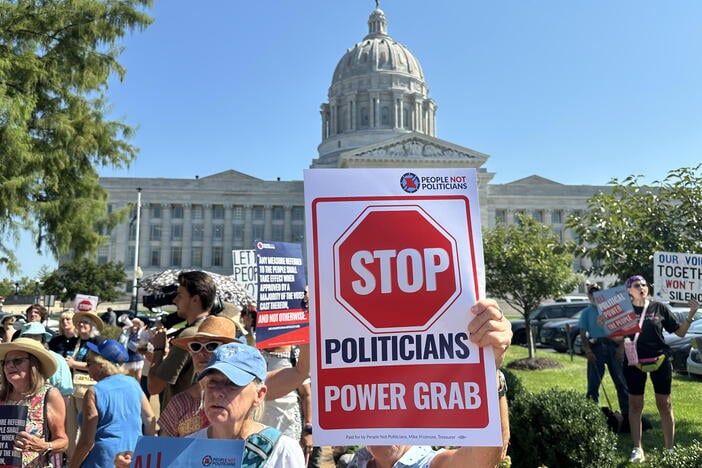 People opposed to a congressional redistricting plan rally outside the Missouri Capitol in Jefferson City. - AP