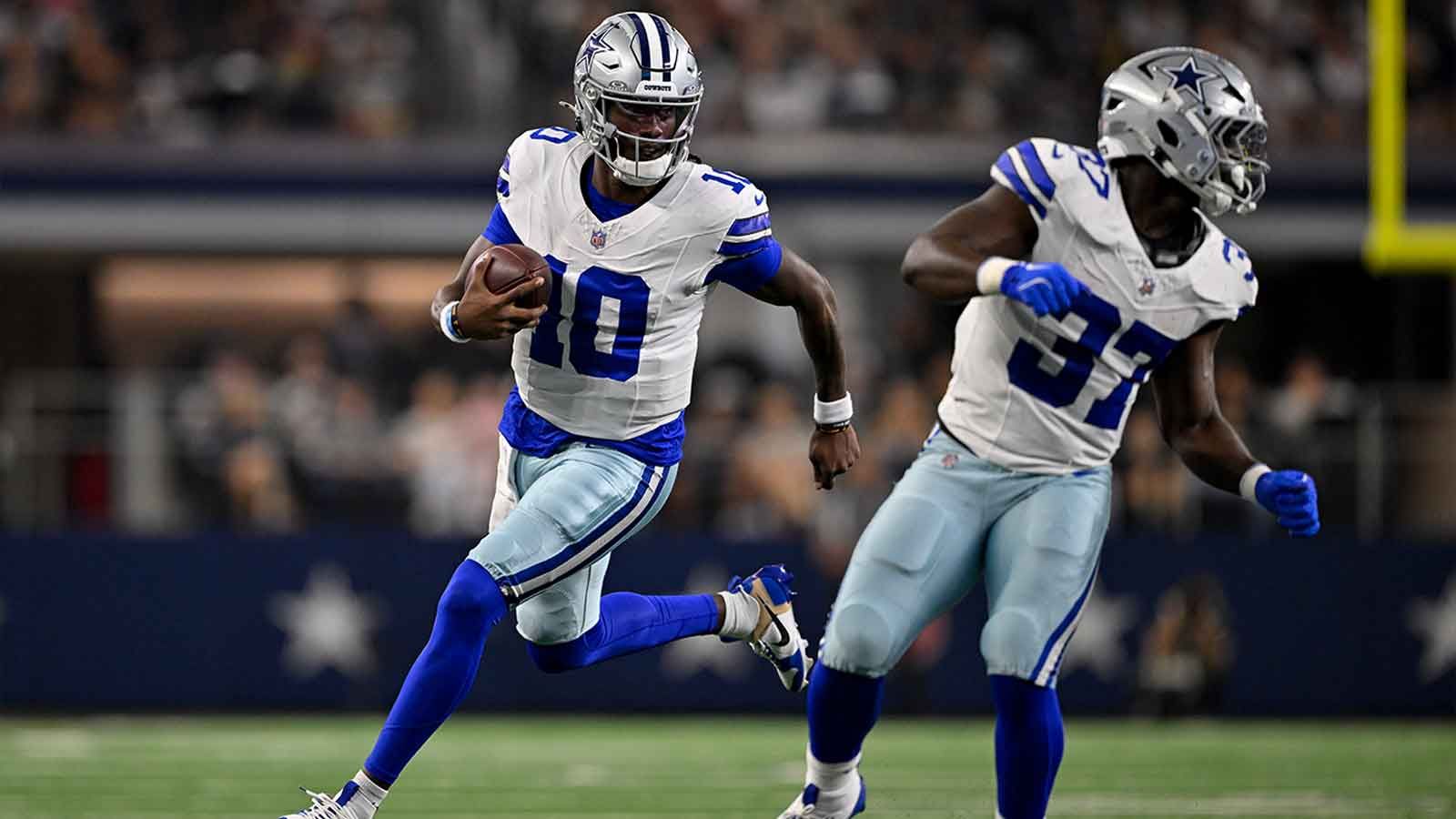Aug 28, 2026; Arlington, Texas, USA; Dallas Cowboys quarterback Joe Milton III (10) runs behind Dallas Cowboys running back Phil Mafah (37) during the game between the Cowboys and the Saints at AT&T Stadium. Mandatory Credit: Jerome Miron-Imagn Images - clutchpoints.com